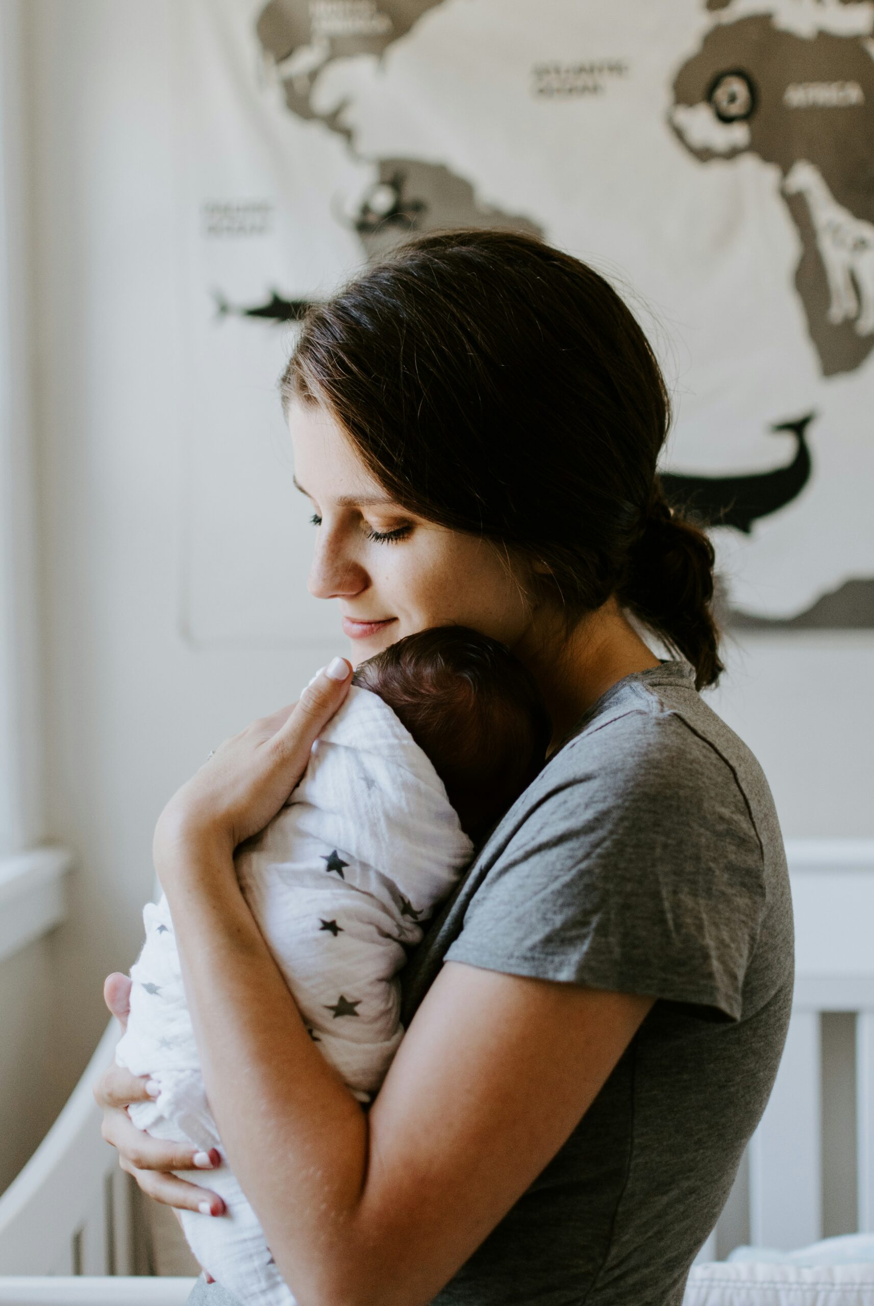 New mother holding her newborn baby